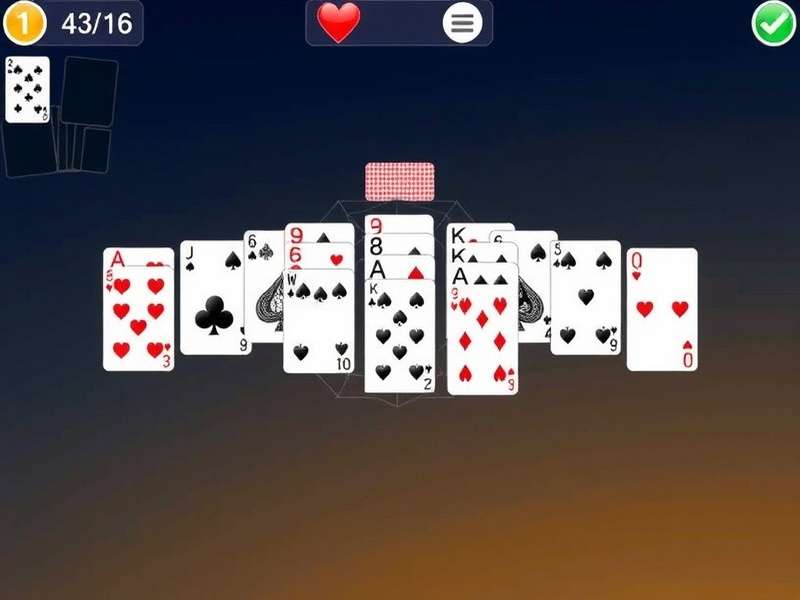 A close-up of a Spider Solitaire game in progress on a digital device