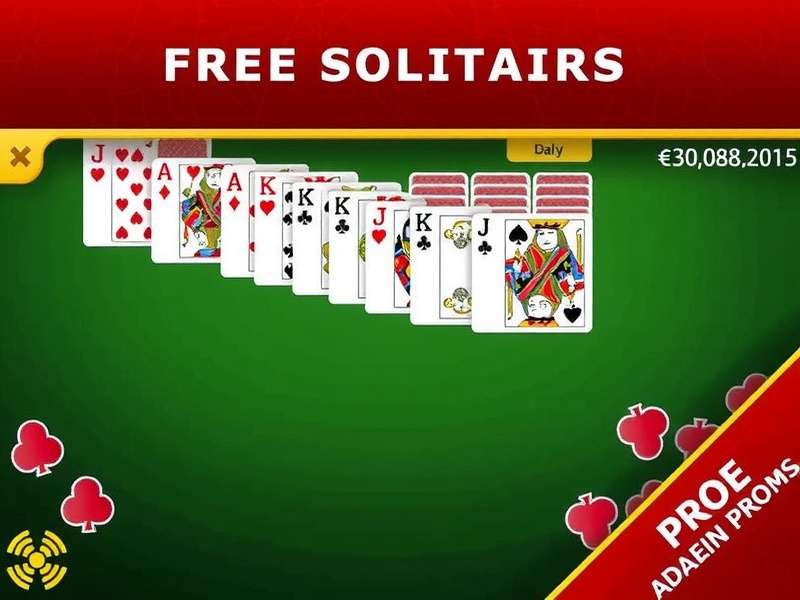 Spider Solitaire game board showing cards arranged in columns with a winning sequence almost complete, played on a laptop in an Indian home setting